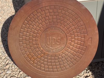 UPS Trophy Man-hole Cover Replica