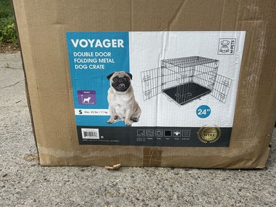 Small wire dog crate. Fits dogs 10-15 lbs comfortabley.
