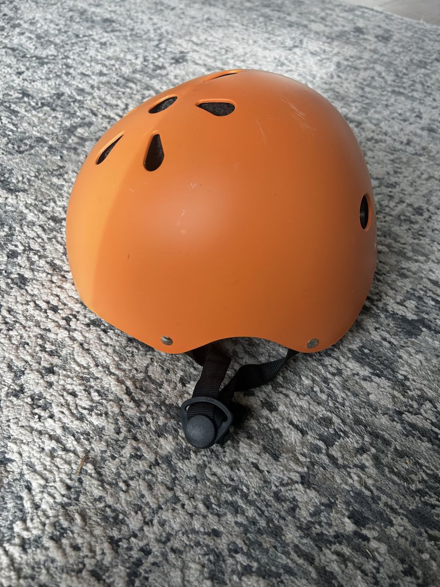 Adjustable kids orange helmet
