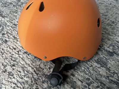 Adjustable kids orange helmet