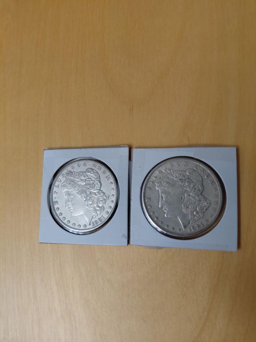 Two Silver Dollars Uncirculated. Beautiful. Cash Only Text 385-414-9627. $150.00 for both.