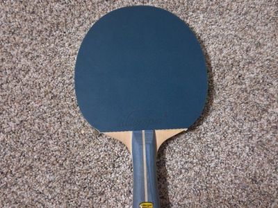9 Ping pong paddles and balls