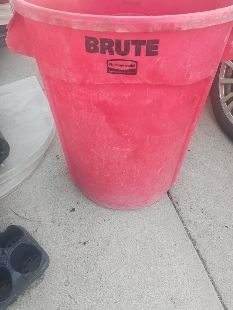 Brute Rubber made red garbage can