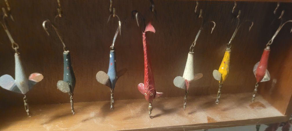Vintage Hand Painted Wooden Fishing Lures Set of 7. 6 wood and 1 is leather. very old.  make me a offer. 25 dollars each.