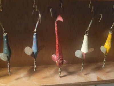 Vintage Hand Painted Wooden Fishing Lures Set of 7. 6 wood and 1 is leather. very old. make me a offer. 25 dollars each.
