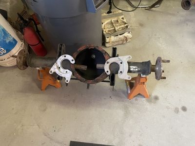 Mopar 8.75" Rear End housing with Axle Housing with Brake Brackets - 33" Mounting Surface to Mounting Surface.