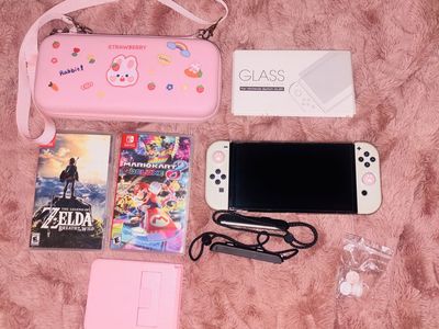 NINTENDO SWITCH OLED + ACCESSORIES + 2 GAMES