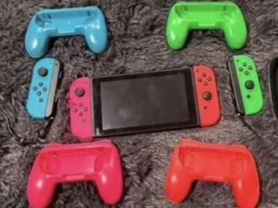 Nintendo Switch Joycons Green/Pink