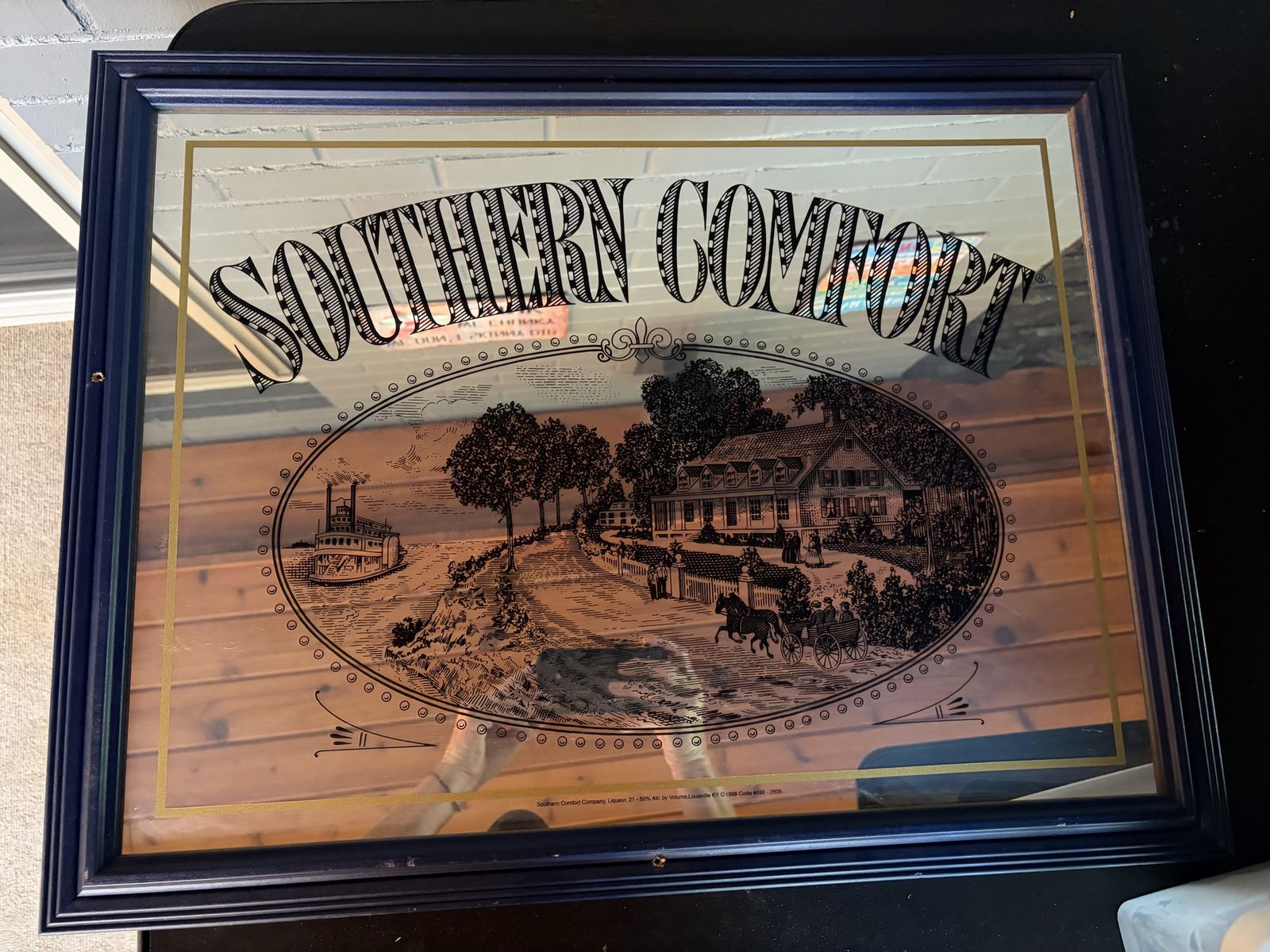 Southern comfort mirror