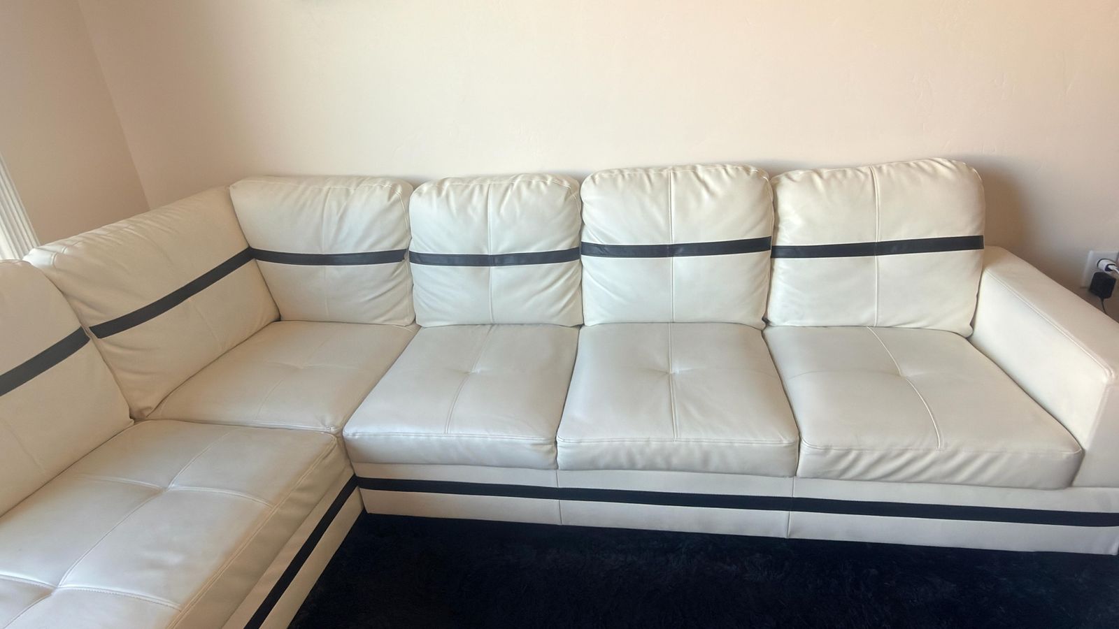 Modern White Faux Leather Sectional Sofa with Black Accent Stripes - Excellent Condition
