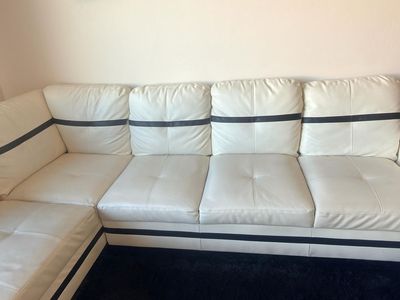 Modern White Faux Leather Sectional Sofa with Black Accent Stripes - Excellent Condition