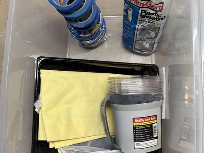 Assorted Painting Materials: Film-Gard Plastic Sheeting, Handy Paint Pail, Rollers, Tape, and Trays