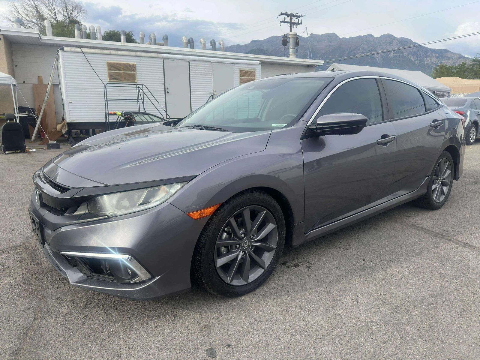 2021 Honda Civic EX — rebuilt & branded title, 29% below market