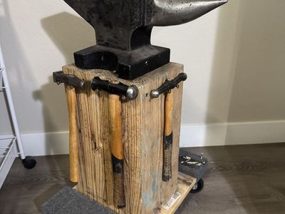 Anvil hammers and rolling stump.
