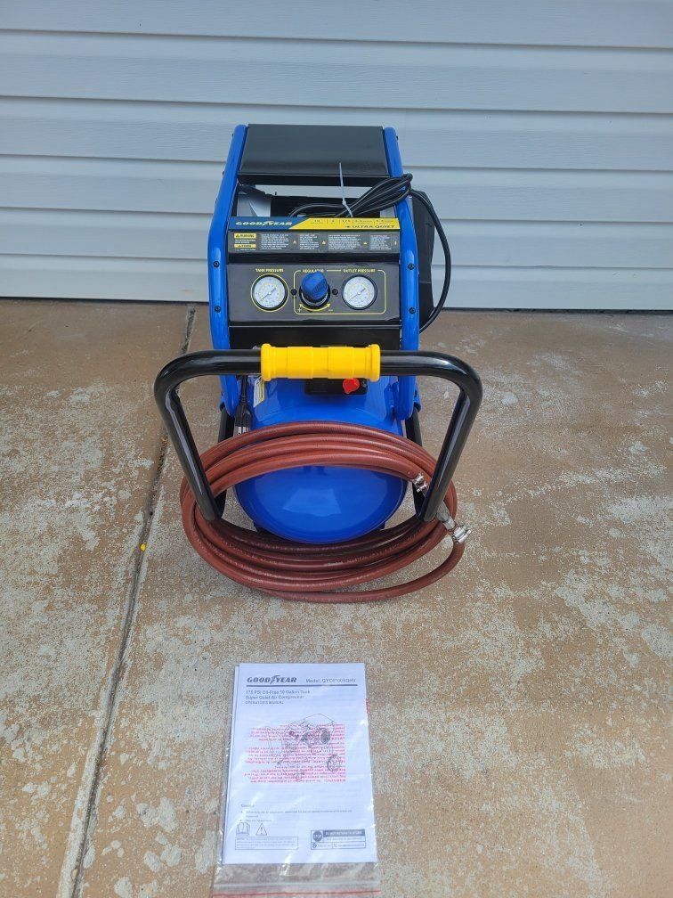 Goodyear Ultra Quiet Air Compressor
with hose.