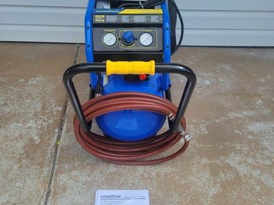 Goodyear Ultra Quiet Air Compressor
with hose.
