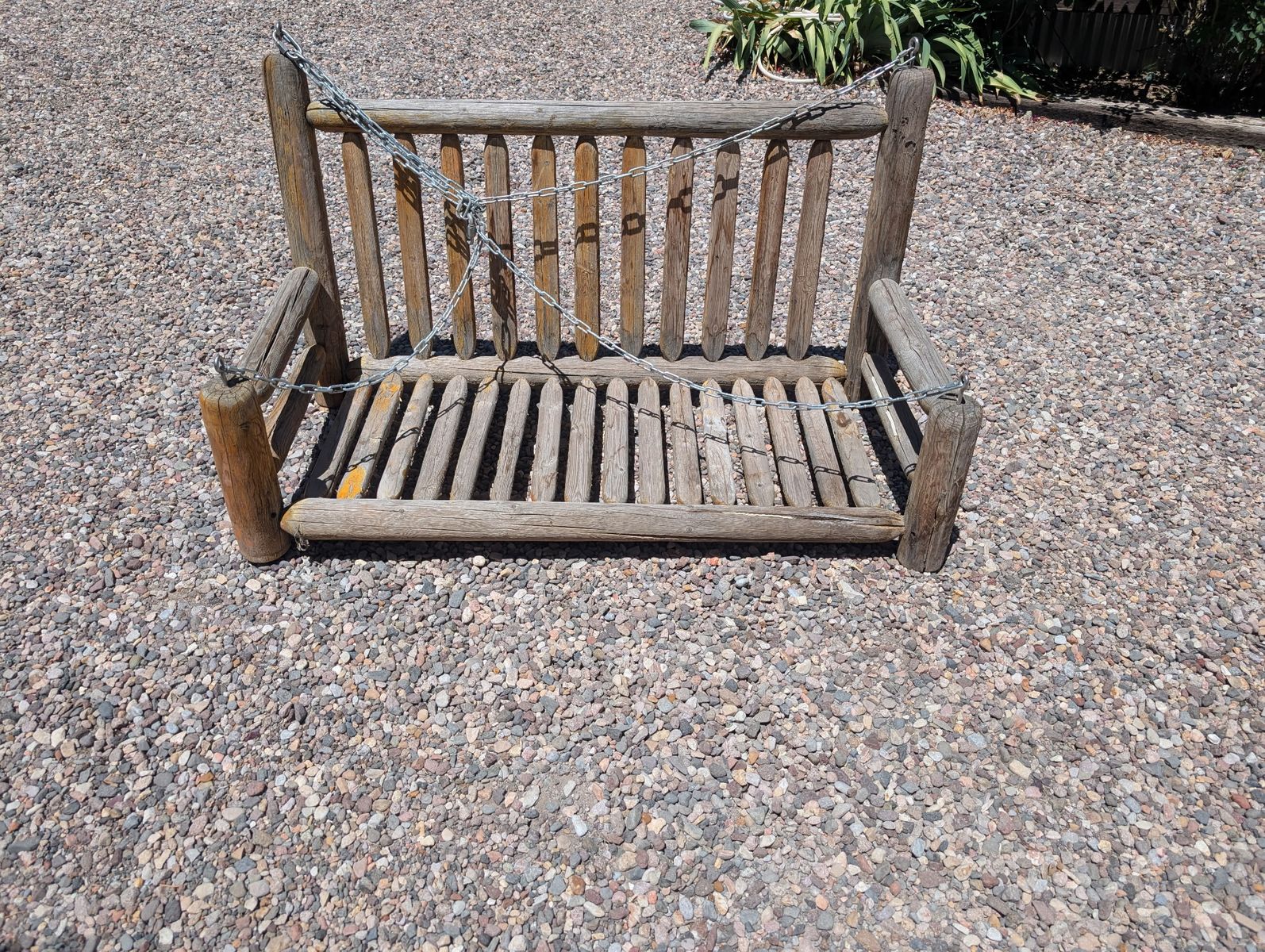 Rustic wooden swing