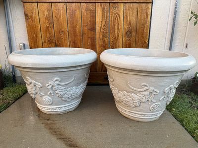 XL decorative planters $40 each 18” tall 22” wide thick plastic