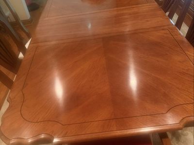 Dining Table with upholstered chairs, China cabinet and surfing table. Includes two extra leaves.