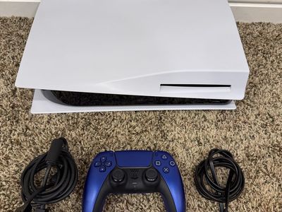 PS5 With Blue Controller