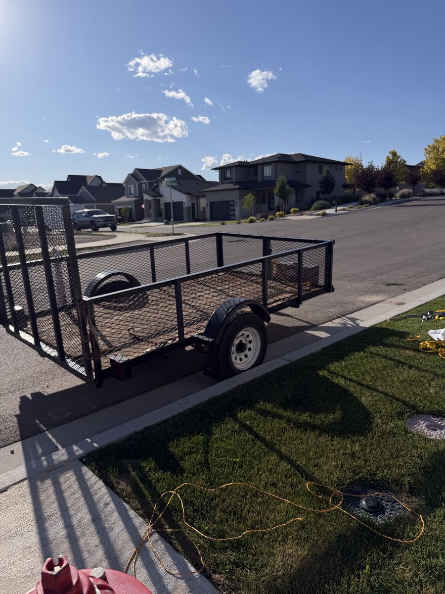 Utility Trailer with Drop-Down Ramp - Ready for Hauling