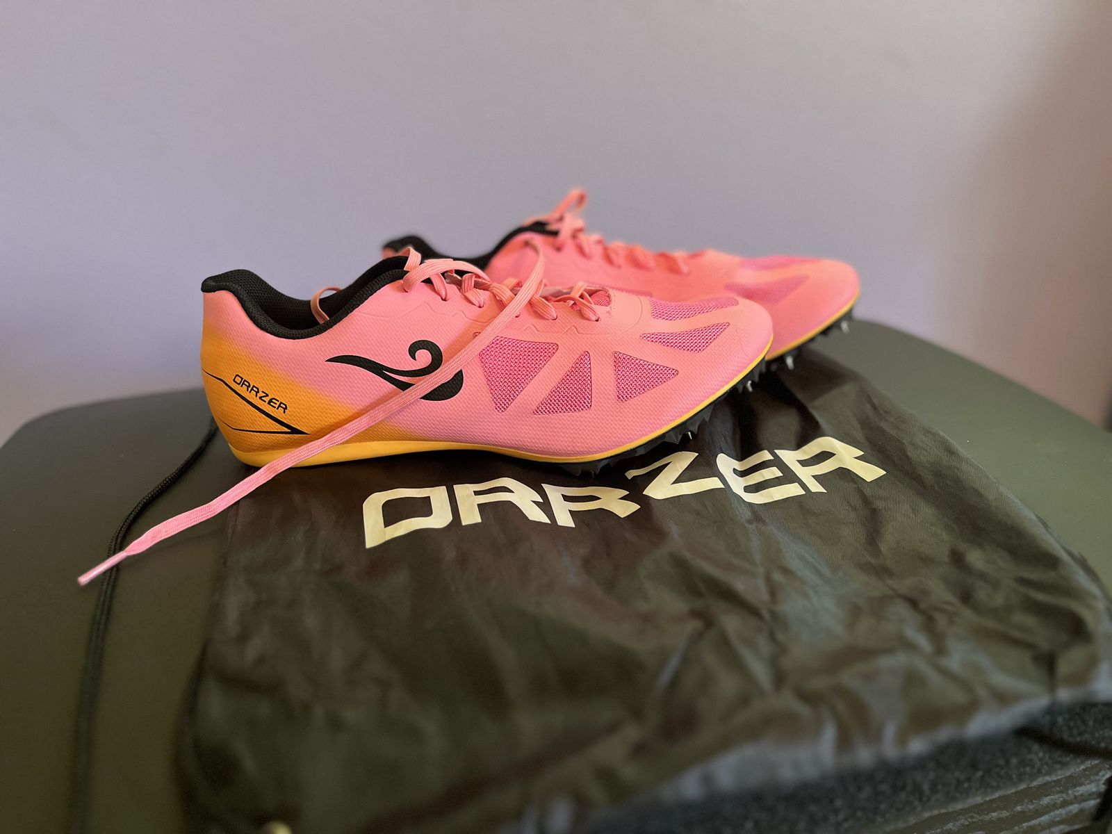 Sprint spikes (pink size 10.5 women) (black size 10 women)