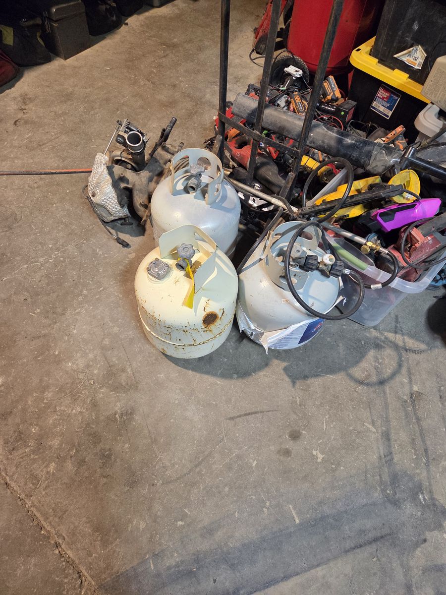 3 propane tanks 1 is full other 2 less than half full 70 for all