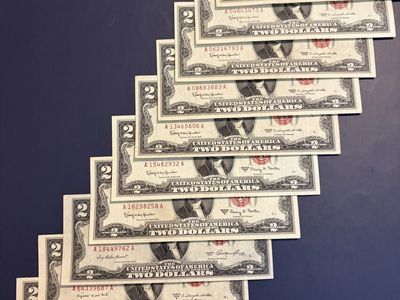 $2 red note bills