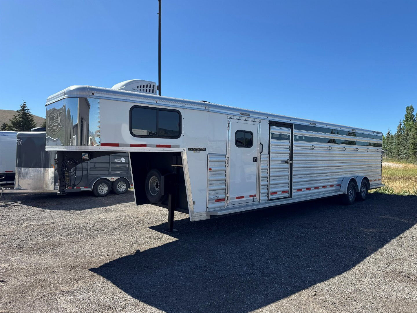 2026 Logan Coach 6 Horse Stockman Combo Horse Trailer
