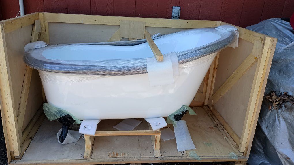 Clawfoot Bathtub - White with Black Claw Feet 
New. Heavy.