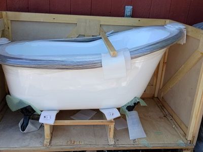 Clawfoot Bathtub - White with Black Claw Feet
New. Heavy.