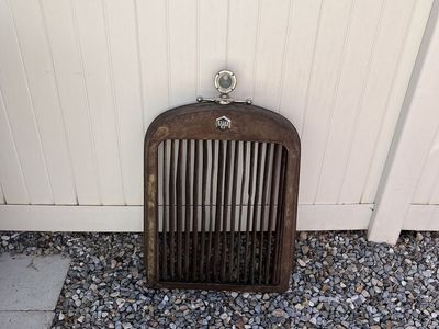 Vintage Essex car grill and moto meter