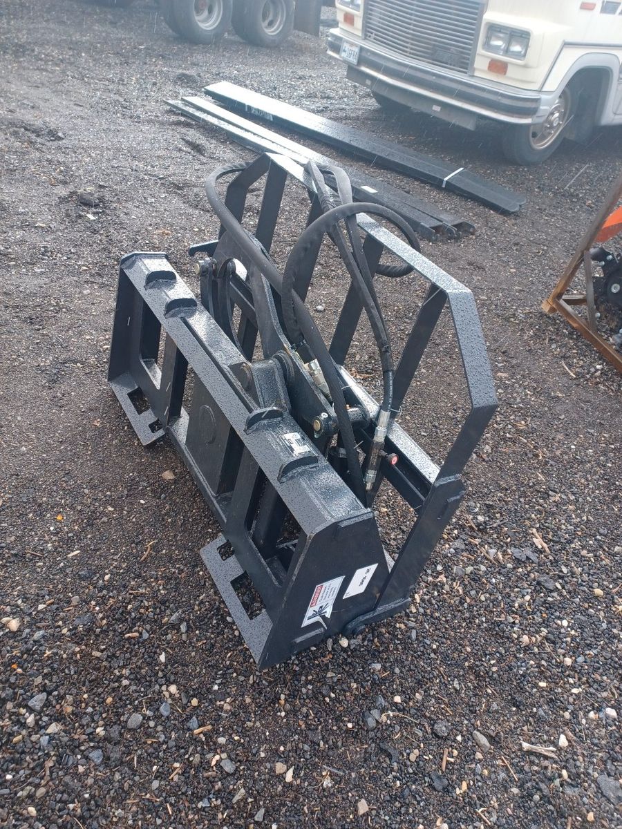 48 in HYDRAULIC TILTING SKID STEER FORKS