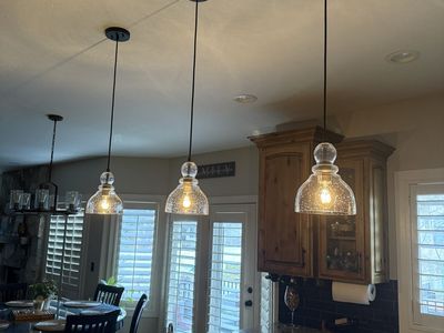 Set of 3 Clear Seeded Glass Pendant Lights with Black Fixtures