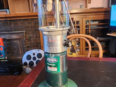 Coleman propane lantern. Double-mantle. Works great. (Propane not included.)