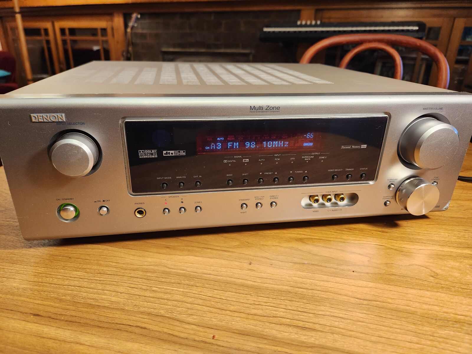 Denon receiver AVR-486, 9.1 Surround sound, has 1 digital opitcal port and two digital coaxial. Sounds great.