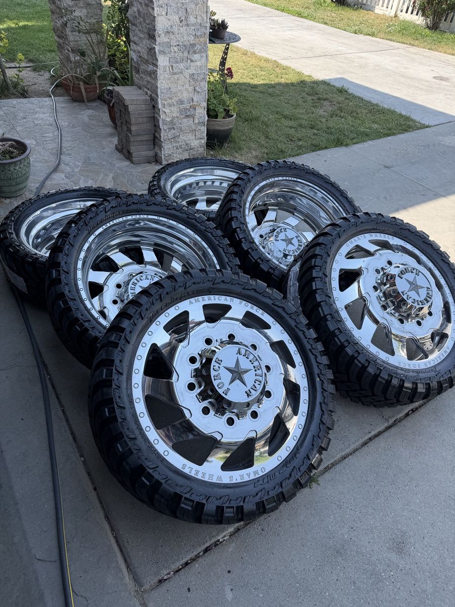 24” American force polished dually wheels on brand new 35” tires