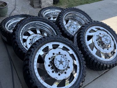 24” American force polished dually wheels on brand new 35” tires