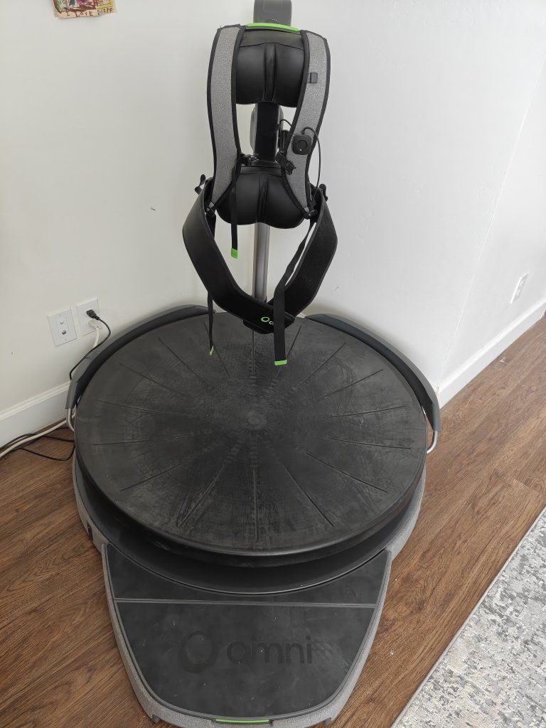 Omni One VR treadmill, headset, and accessories
