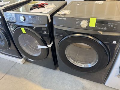 New open box Samsung 4.5 cu. ft. Front Load Washer with Vibration Reduction Technology+ and 7.5 cu. ft. ELECTRIC Dryer