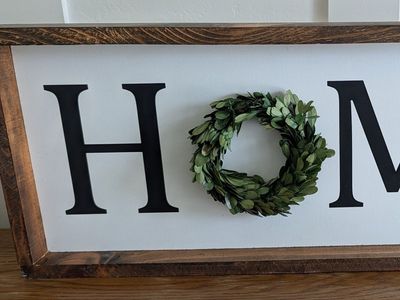 Wood framed, vinyl HOME sign