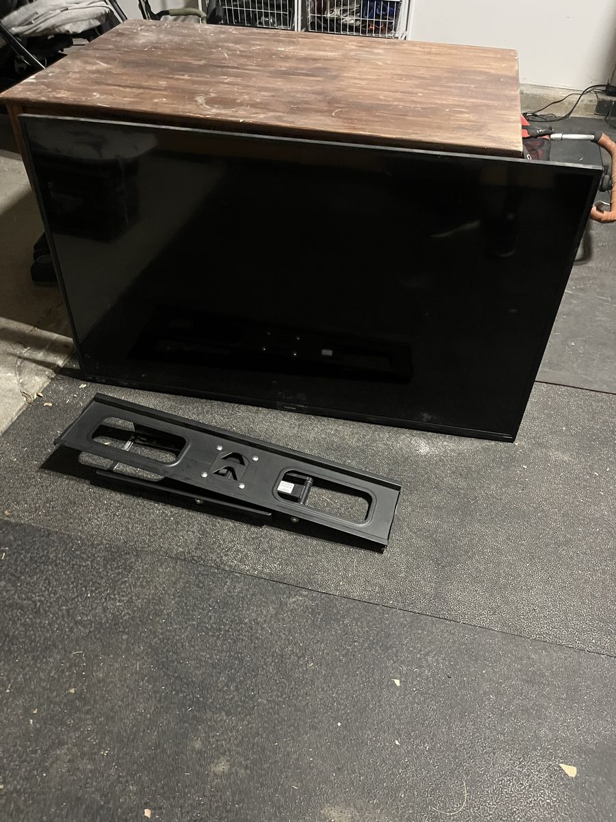 50” TV and wall bracket