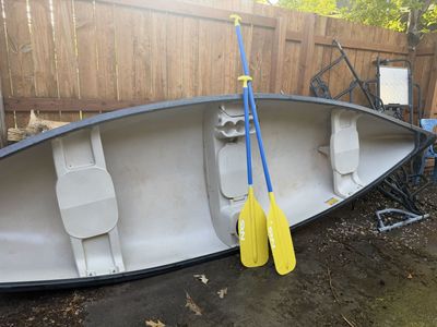 Canoe w paddles and caddy