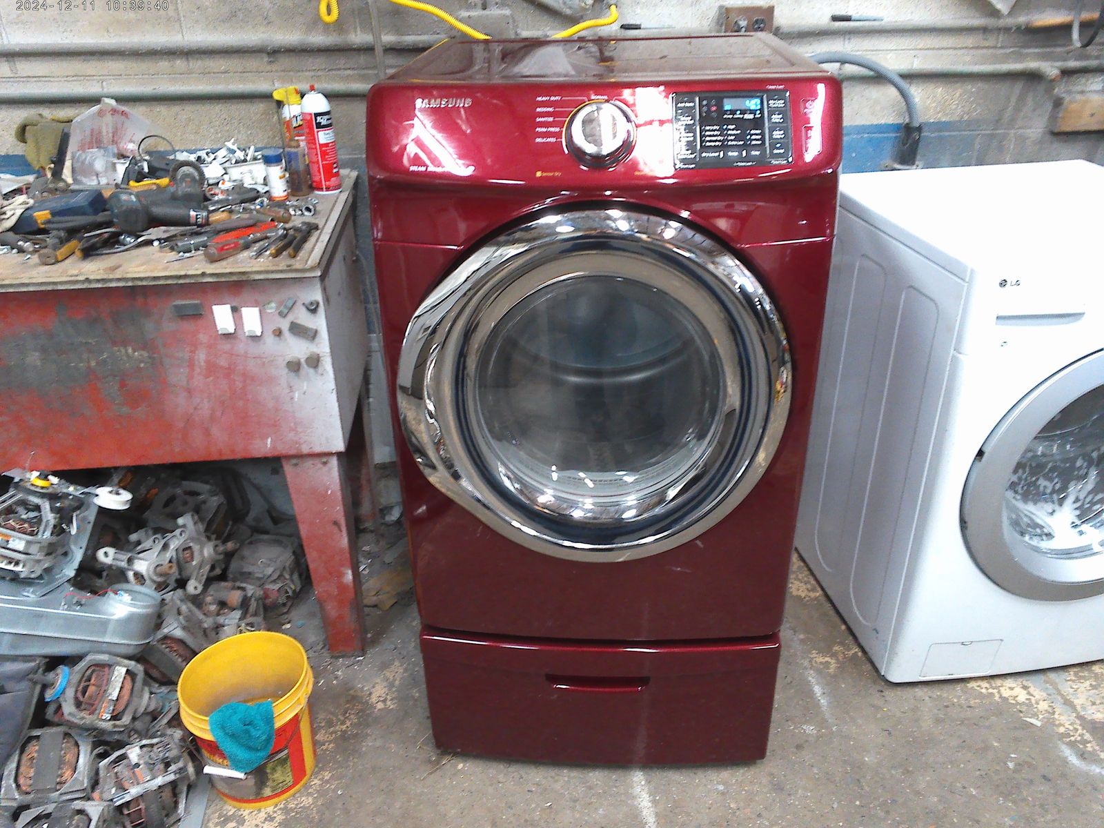 Samsung front load electric dryer on pedestal