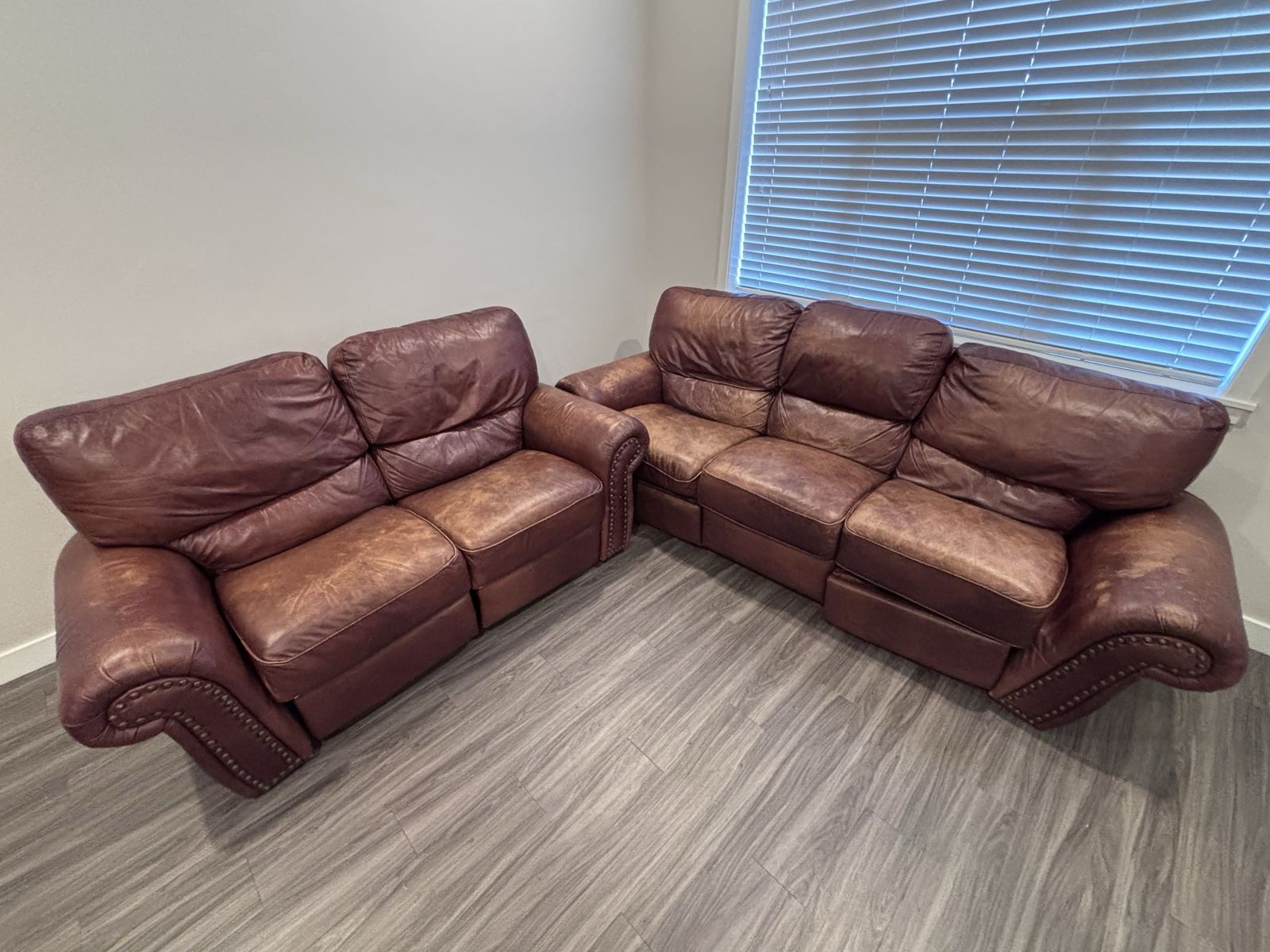 Brown Reclining Sofa and Love Seat