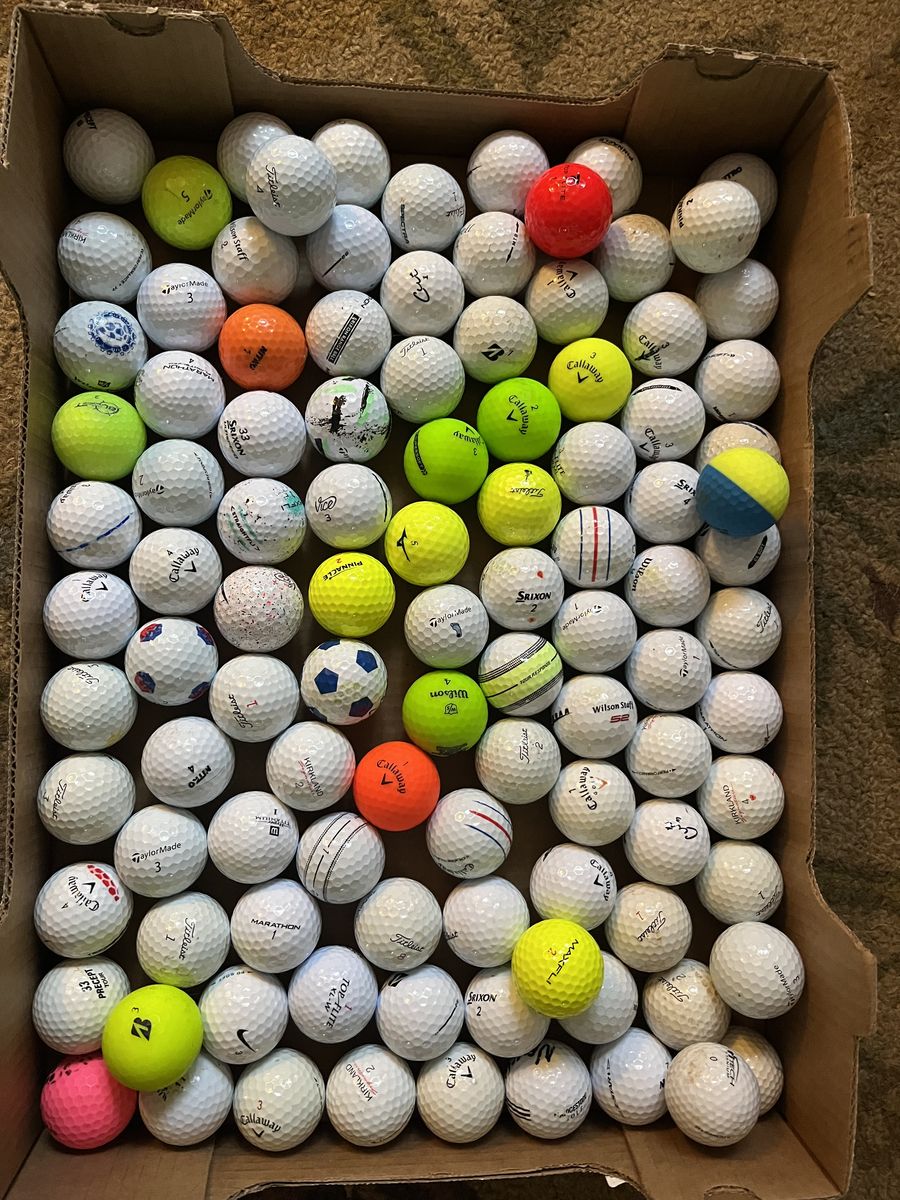 100 used golf balls