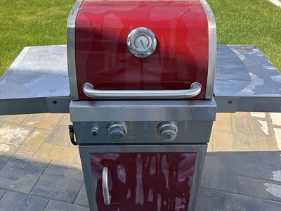 Compact Red Gas Grill with Side Tables - Perfect for Patios and Small Spaces