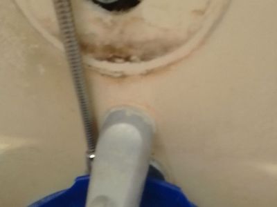 I need an affordable, licensed plumber who can replace my cartridge in a Moen bathtub faucet. Is it possible to switch