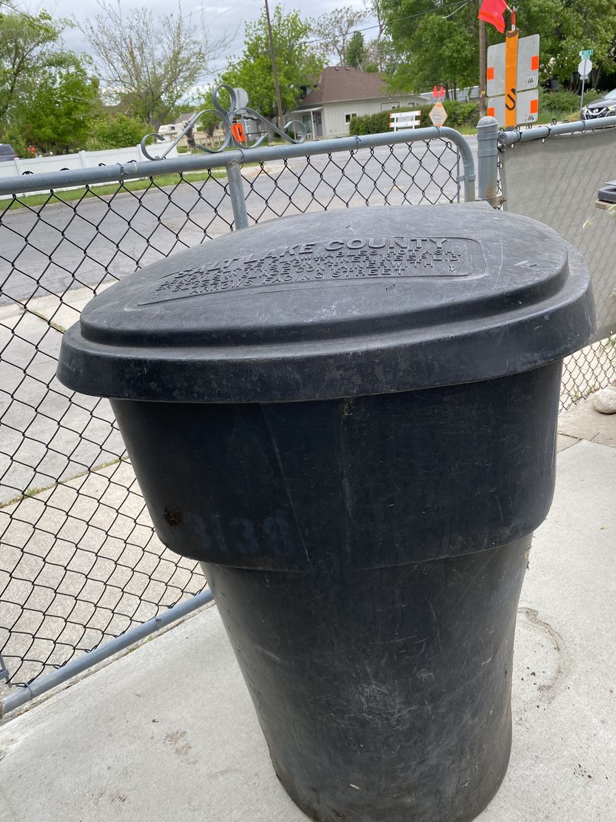 Black garbage container