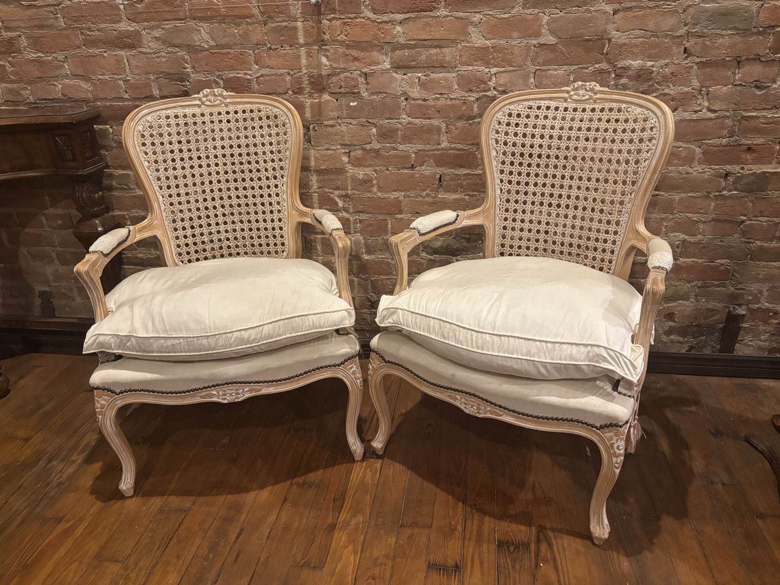 Pair of white chairs with soft cushion